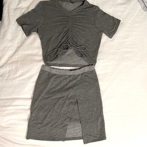 Super soft wrapped skirt and cinch top in dark Heather. Looks brand new!